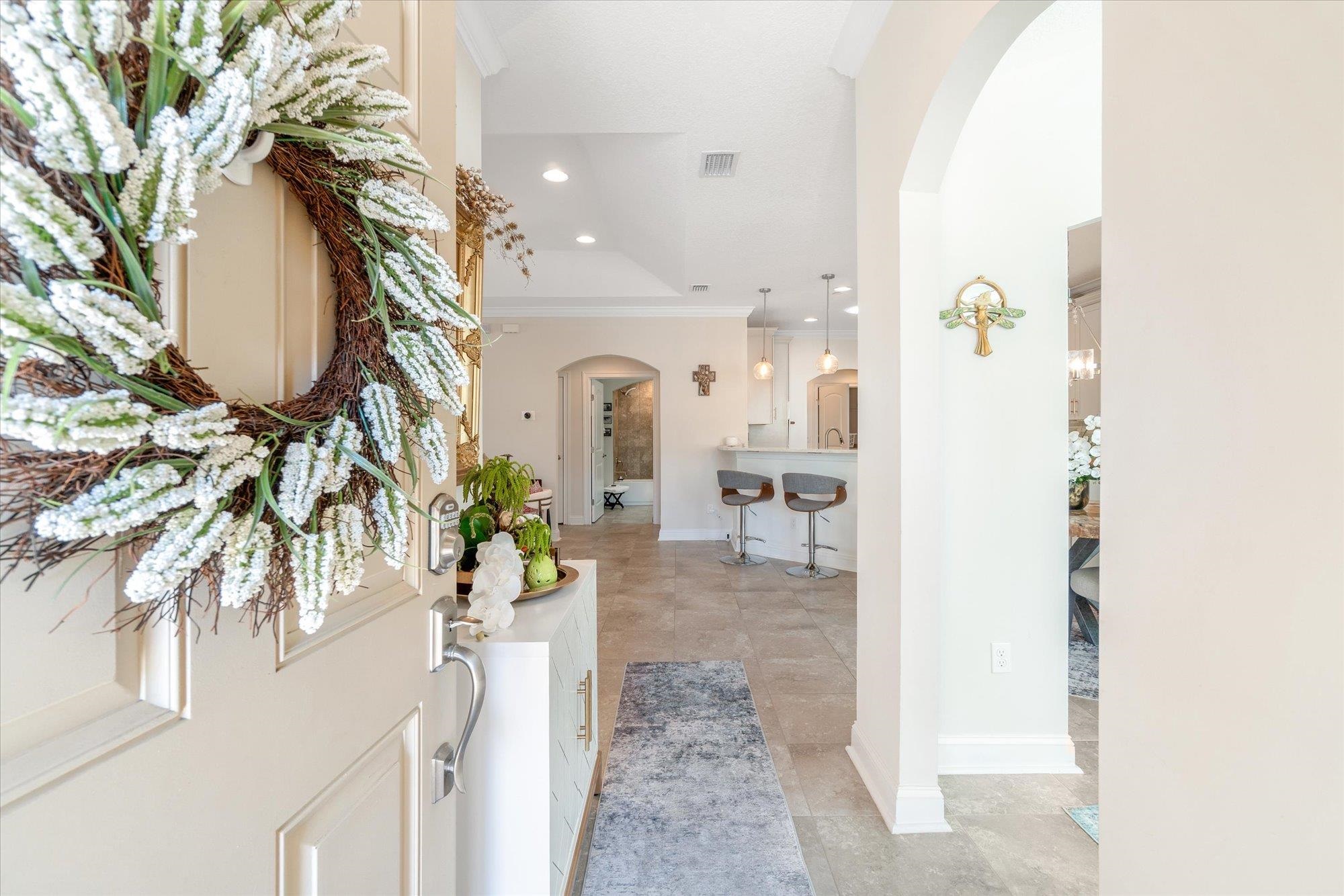 82 Timoga Trail St. Augustine, FL 32084 - Photo 8 of 62 a view of living room kitchen and entryway