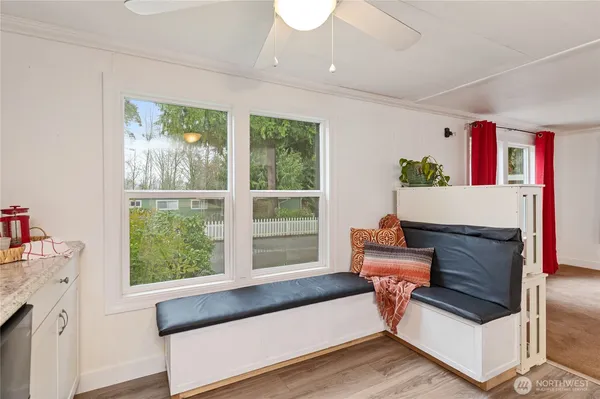 a living room with furniture and a window