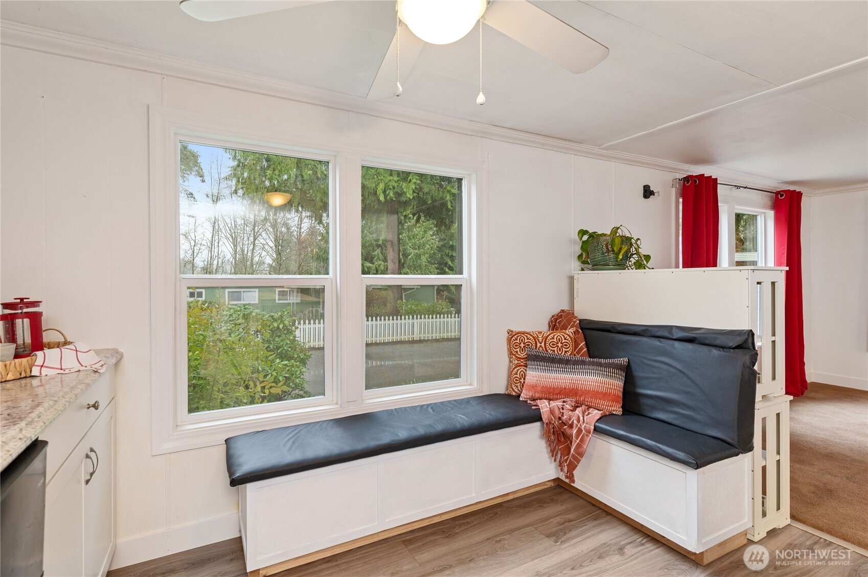 3060 Northeast McWilliams Road, Unit 52 Bremerton, WA 98311 - Photo 15 of 27 a living room with furniture and a window
