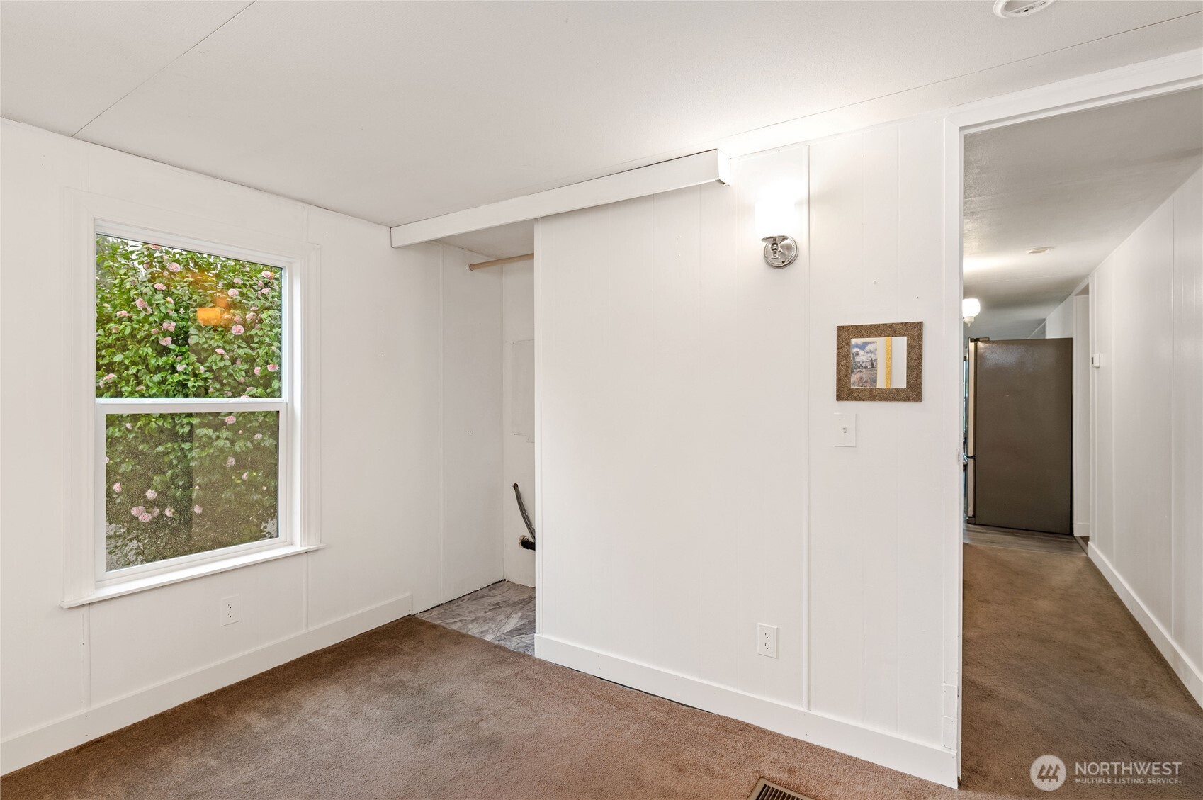 3060 Northeast McWilliams Road, Unit 52 Bremerton, WA 98311 - Photo 21 of 27 an empty room with windows and closet