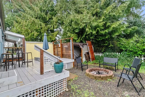 a view of an chairs and tables in the patio