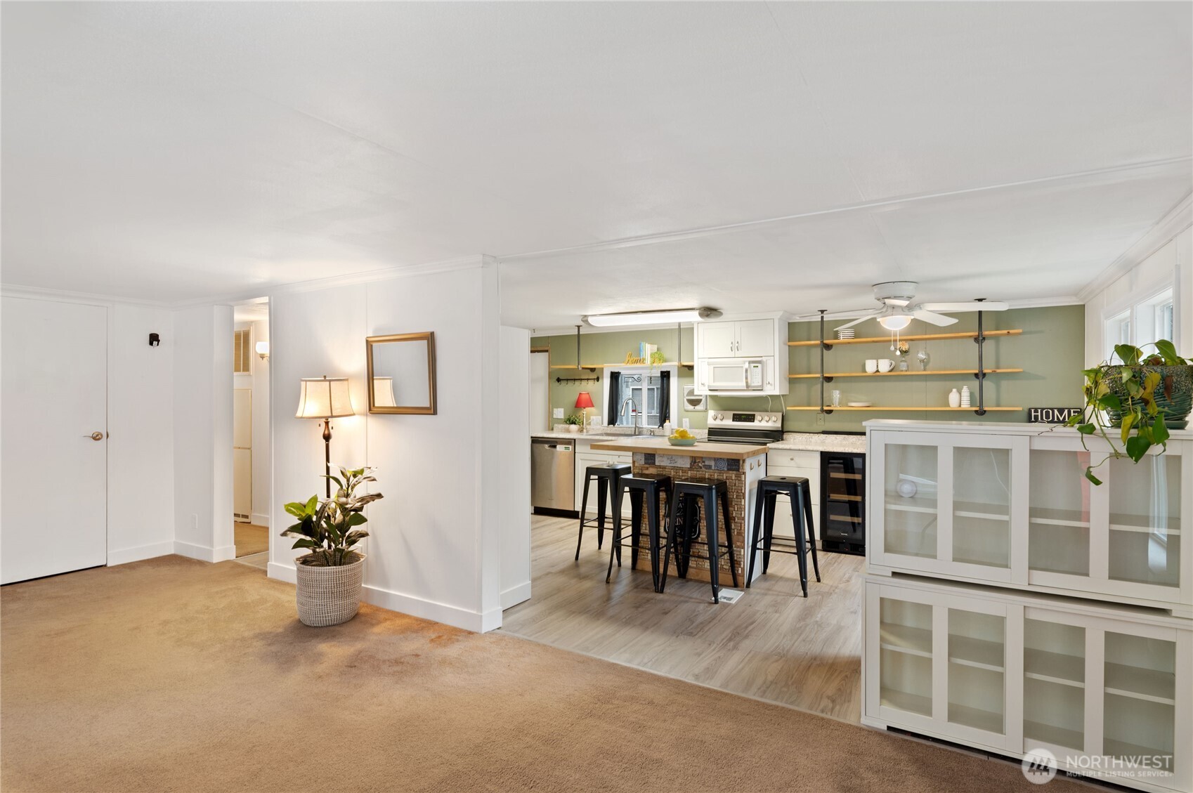 3060 Northeast McWilliams Road, Unit 52 Bremerton, WA 98311 - Photo 5 of 27 a view of a livingroom with furniture and window