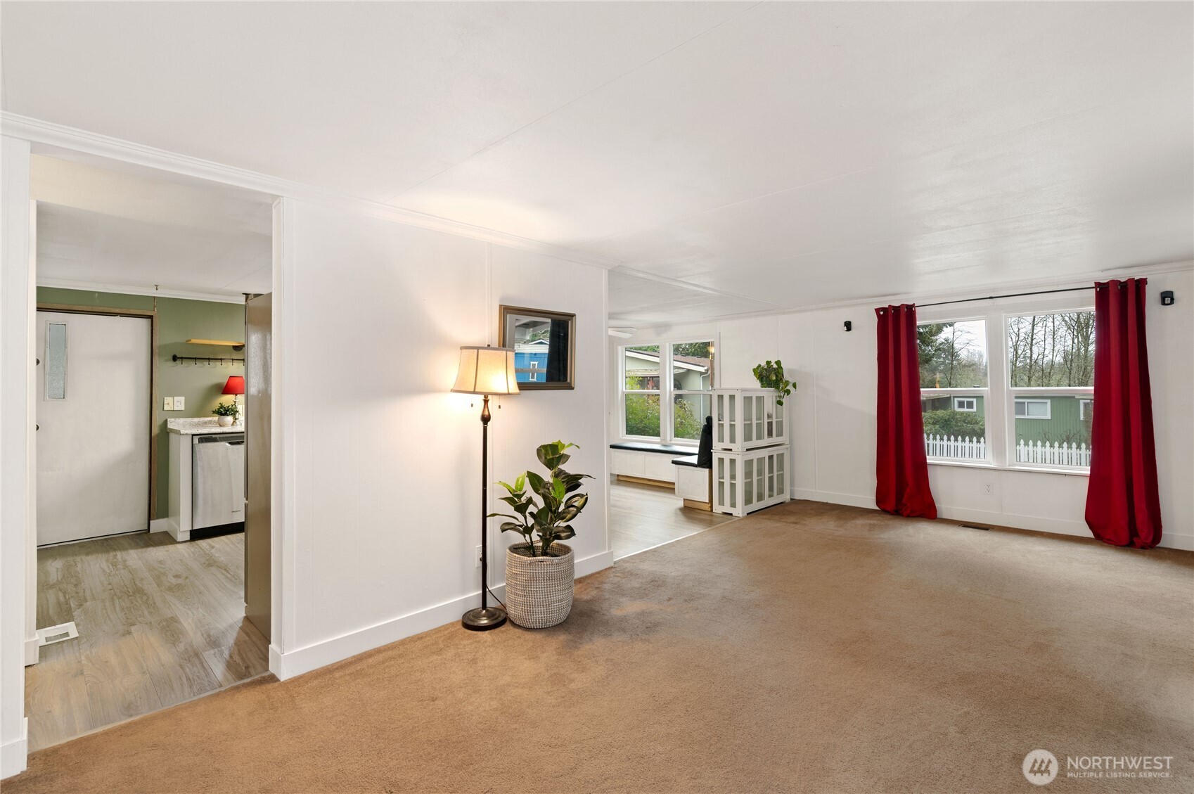 3060 Northeast McWilliams Road, Unit 52 Bremerton, WA 98311 - Photo 6 of 27 an empty room with furniture and a window