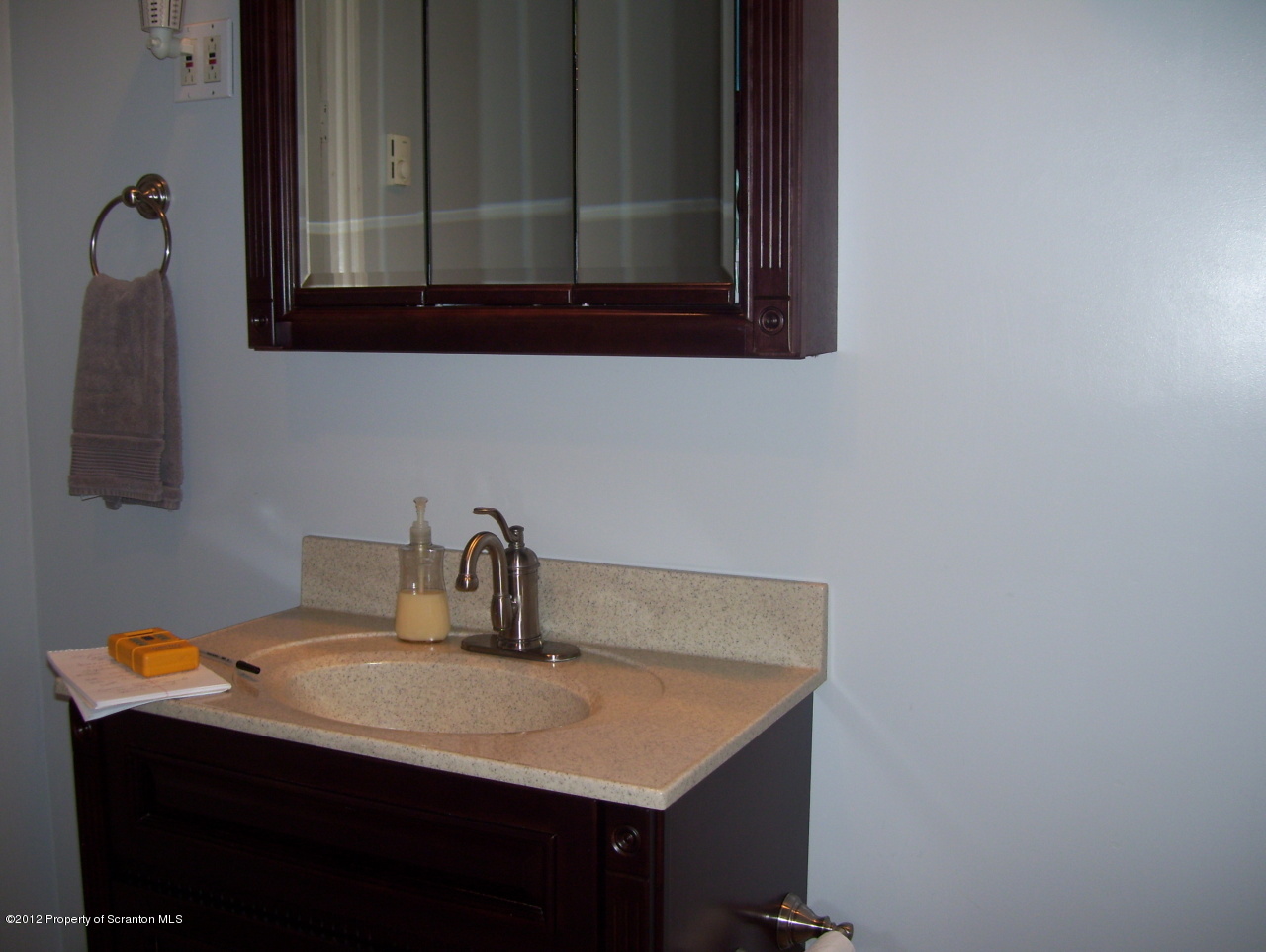131 Mowry Road Meshoppen, PA 18630 - Photo 18 of 21 a bathroom with a sink and a mirror