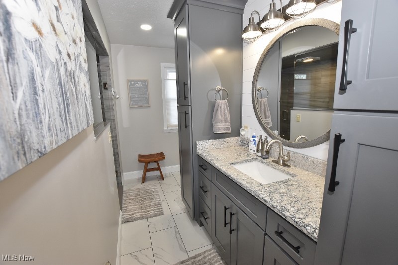 1251 Arrowhead Drive Southwest Dellroy, OH 44620 - Photo 26 of 50 This remodeled ensuite bathroom offers quality & luxury for the owners