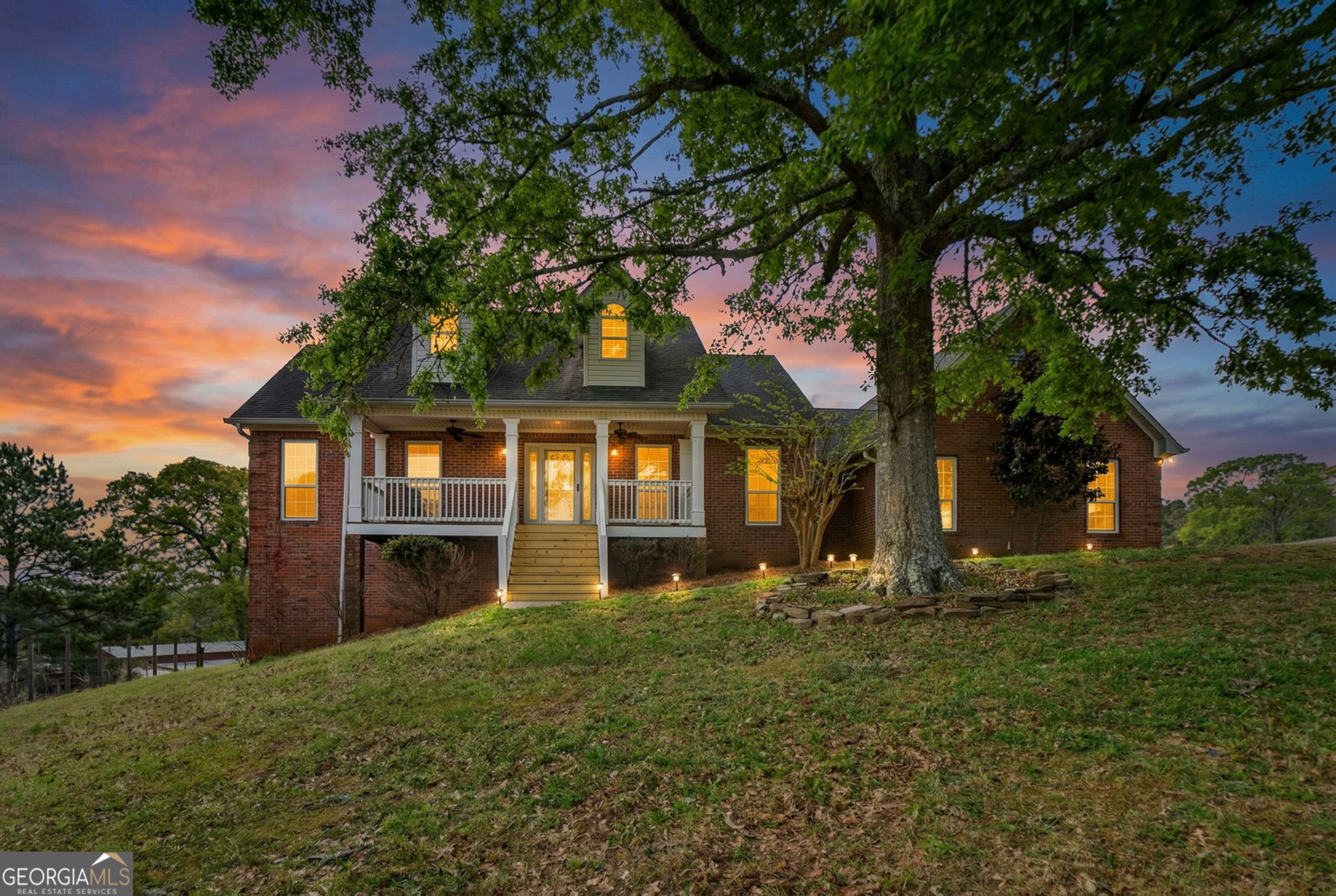 955 Mocassin Gap Road Locust Grove, GA 30248 - Photo 1 of 59 a front view of a house with a yard