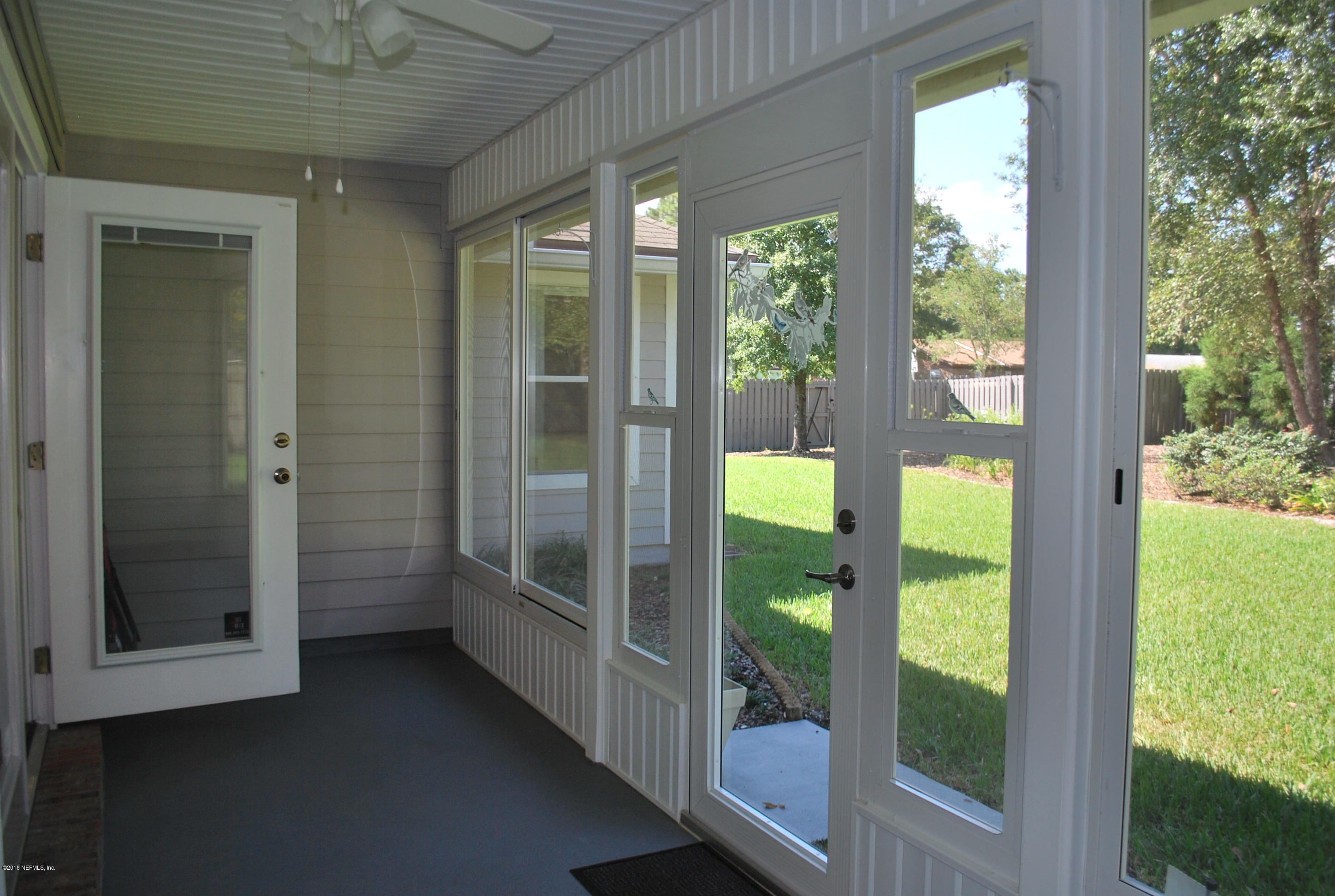 8089 Springtree Road Jacksonville, FL 32210 - Photo 42 of 59 Enclosed patio