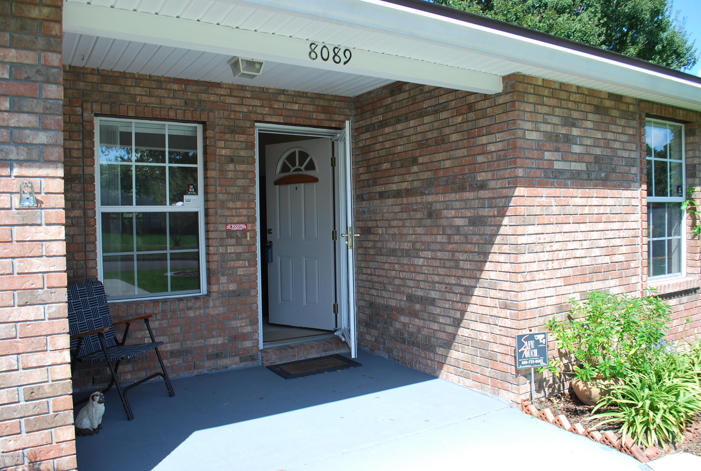 8089 Springtree Road Jacksonville, FL 32210 - Photo 5 of 59 Double door entry