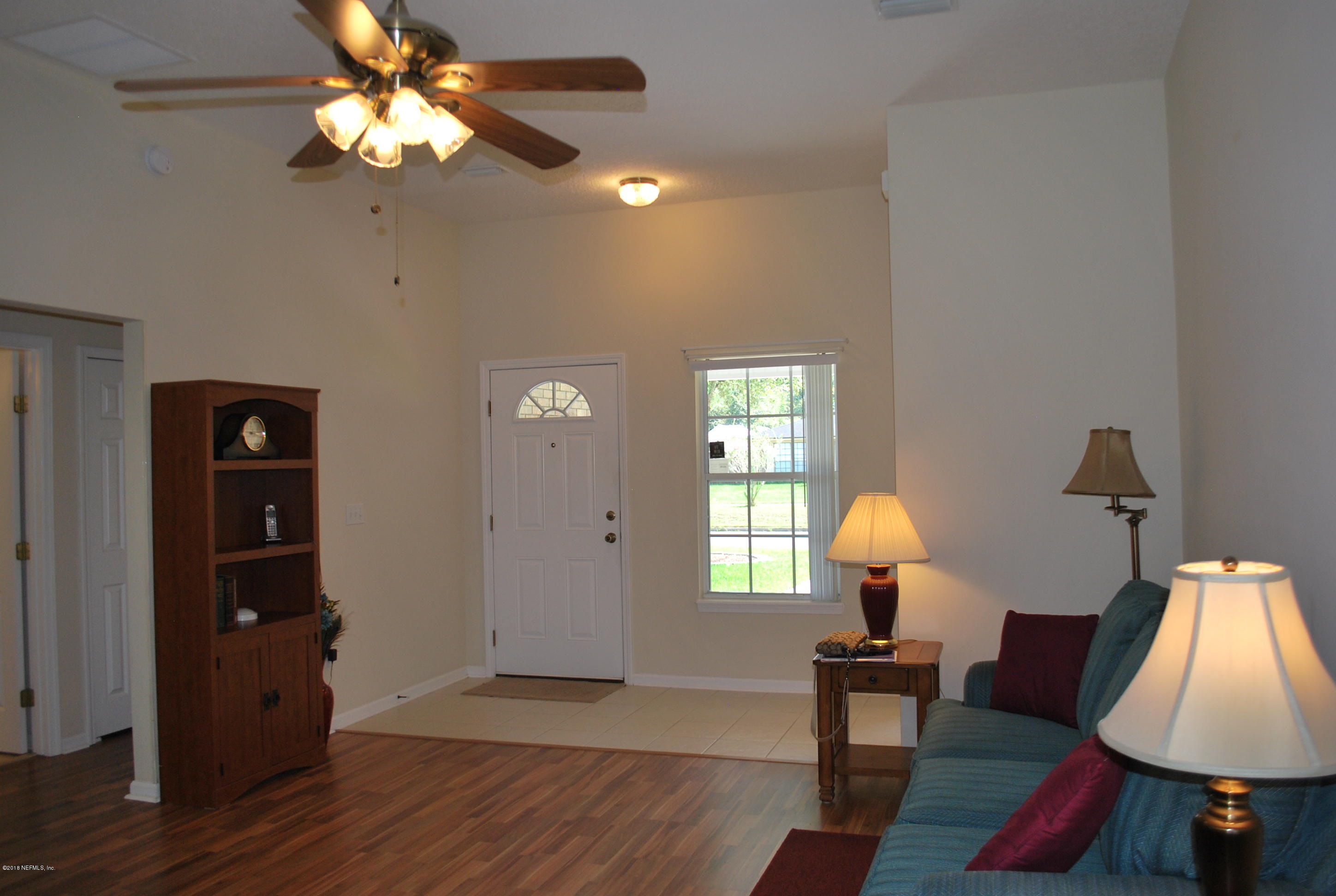 8089 Springtree Road Jacksonville, FL 32210 - Photo 7 of 59 Living room off foyer