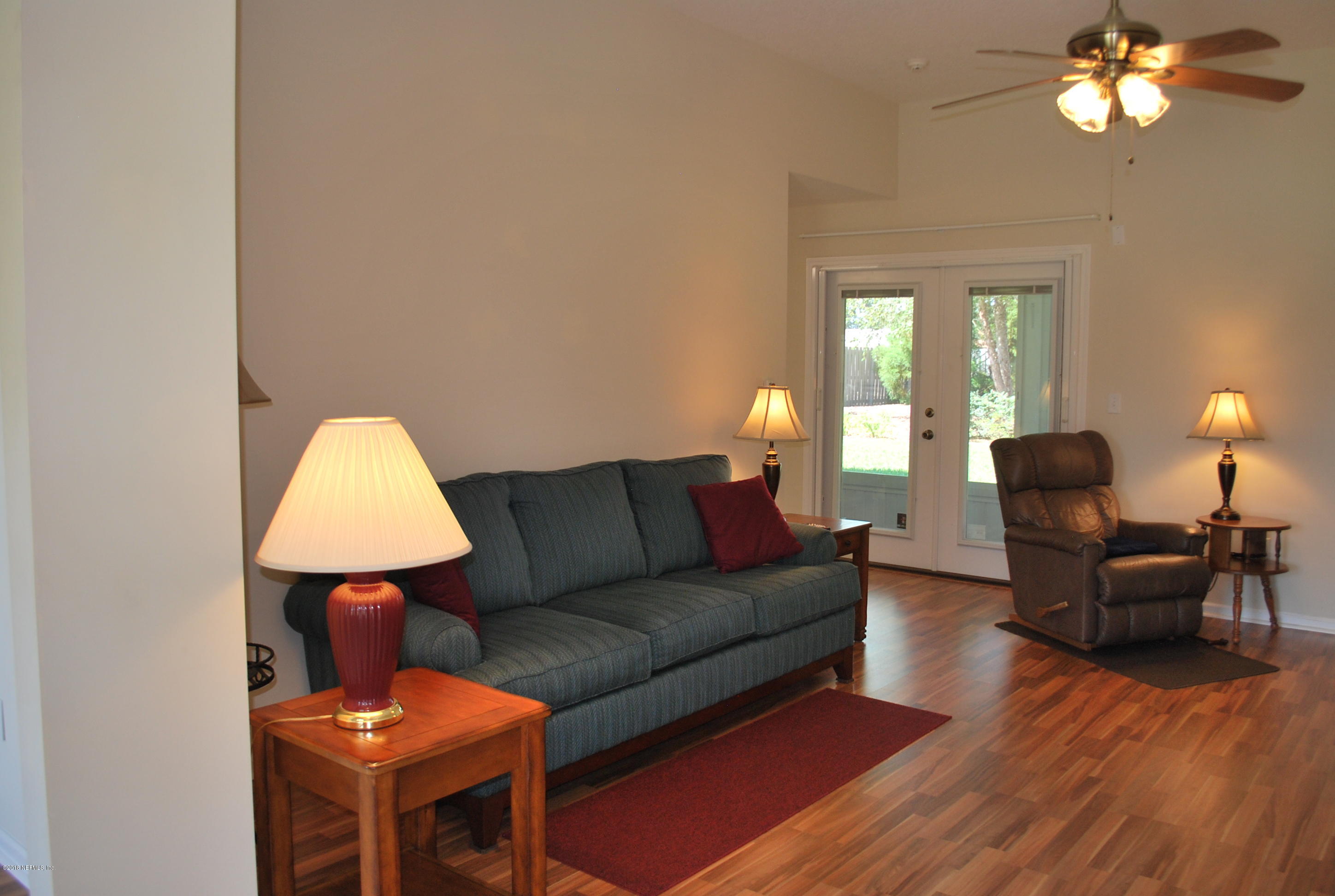 8089 Springtree Road Jacksonville, FL 32210 - Photo 8 of 59 Living area opens to porch