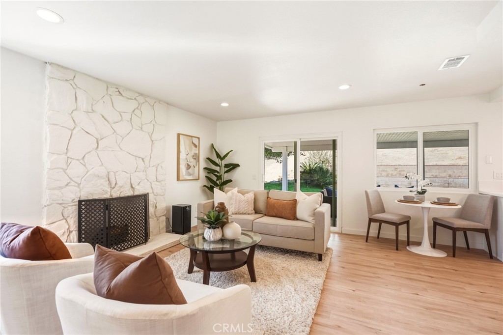 3343 Brookridge Road Duarte, CA 91010 - Photo 26 of 73 Family room with a stone fireplace