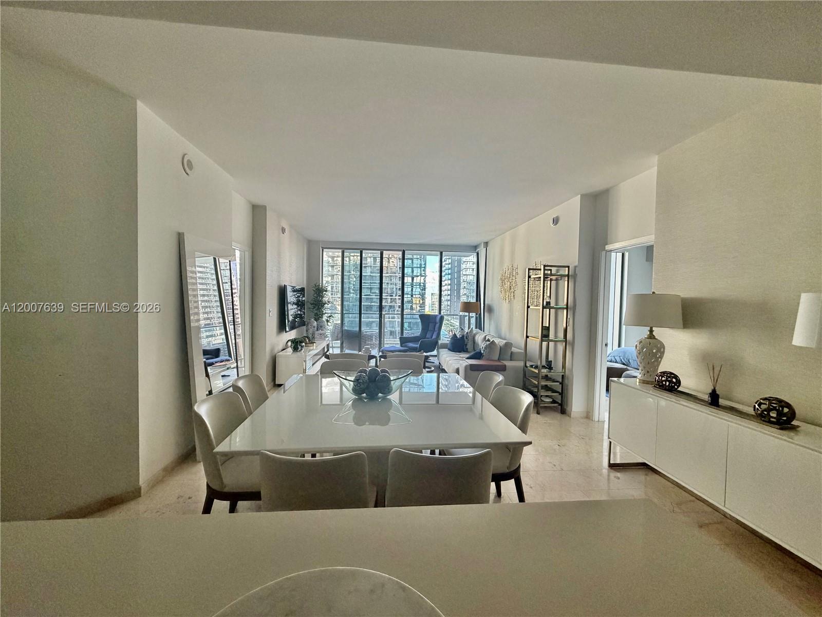 88 Southwest 7th Street, Unit 1109 Miami, FL 33130 - Photo 15 of 40 a view of a living room and kitchen