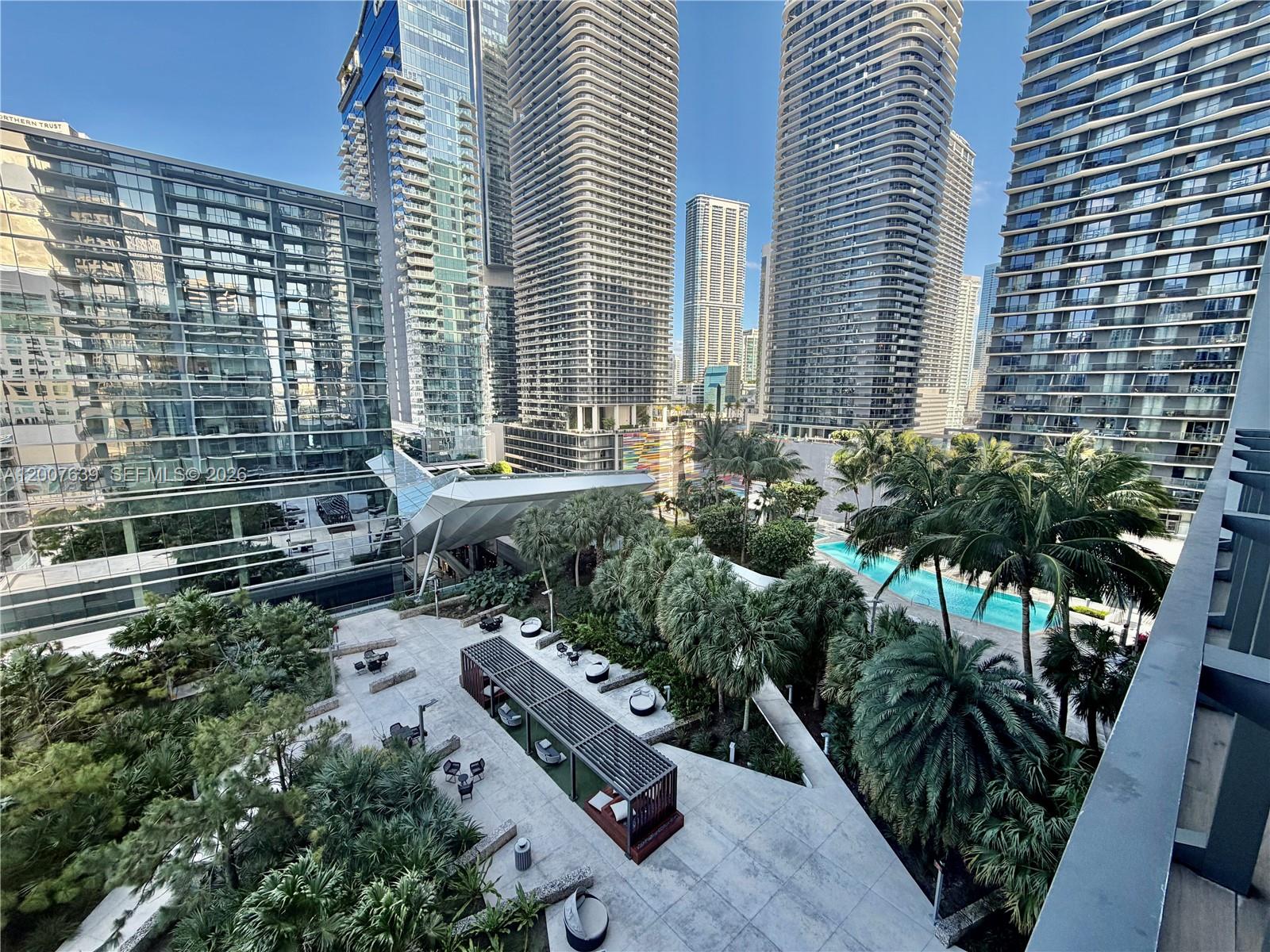 88 Southwest 7th Street, Unit 1109 Miami, FL 33130 - Photo 6 of 40 a view of backyard with outdoor seating and plants