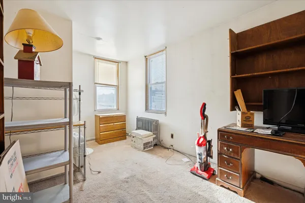 a room with furniture and a window