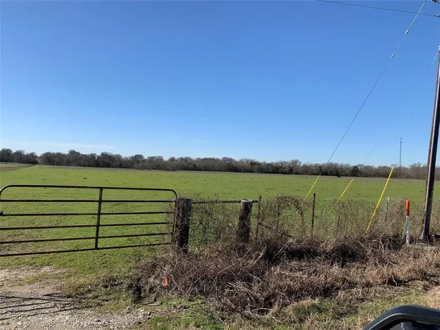 a view of a lake from a yard