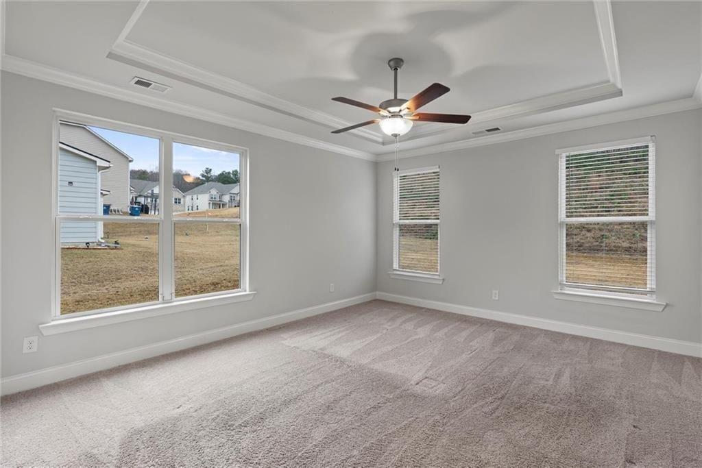 3455 Spring Pl Court Loganville, GA 30052 - Photo 19 of 42 a view of an empty room with a window