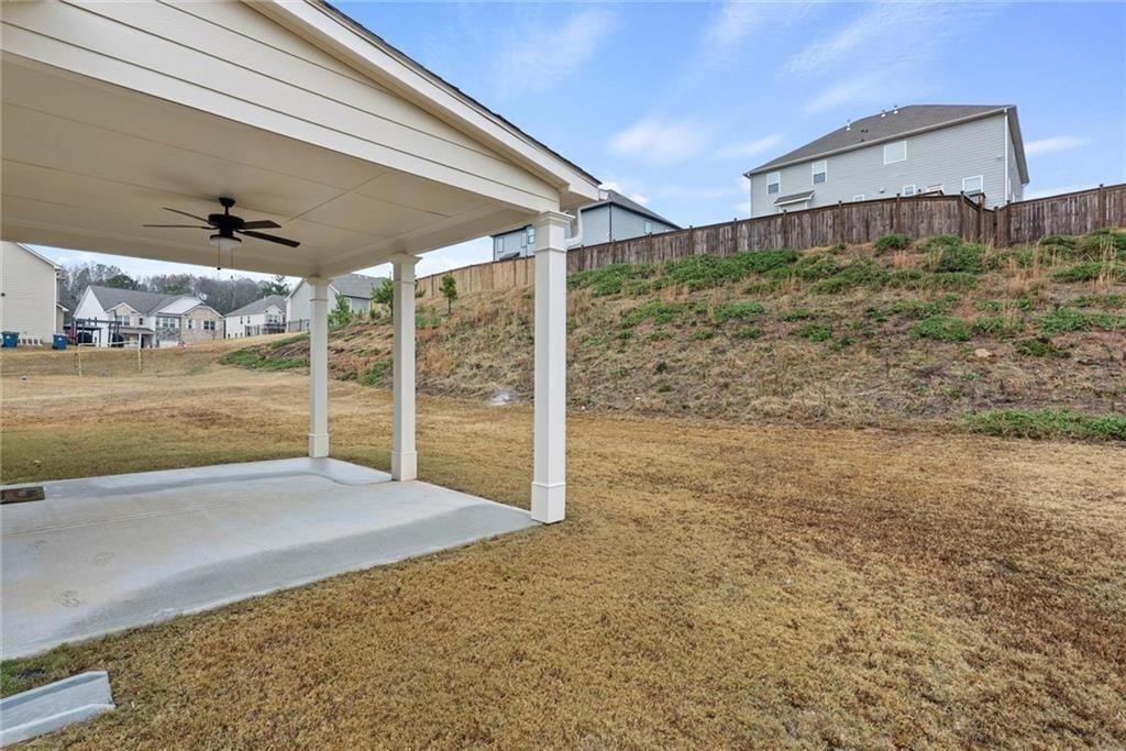 3455 Spring Pl Court Loganville, GA 30052 - Photo 34 of 42 a view of a backyard of the house