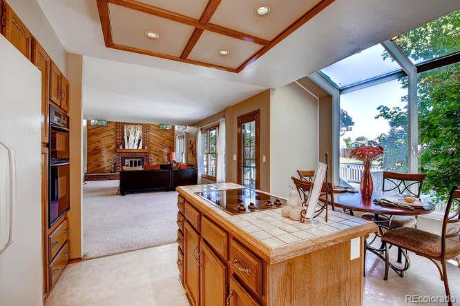 8205 Sweet Water Road Lone Tree, CO 80124 - Photo 10 of 33 a view of a living room and kitchen