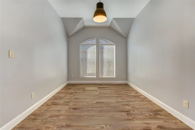 a view of a room that has a window in it