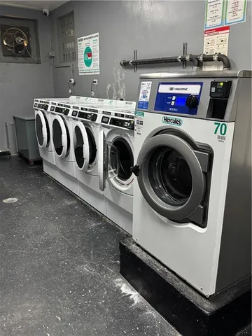 a front view of a building with garden