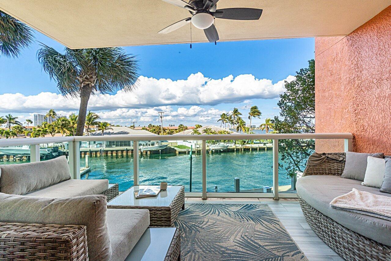 a view of a patio with couches table and chairs
