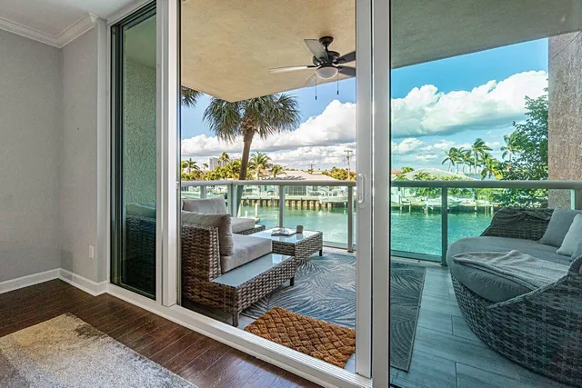 view of living room with furniture and floor to ceiling window