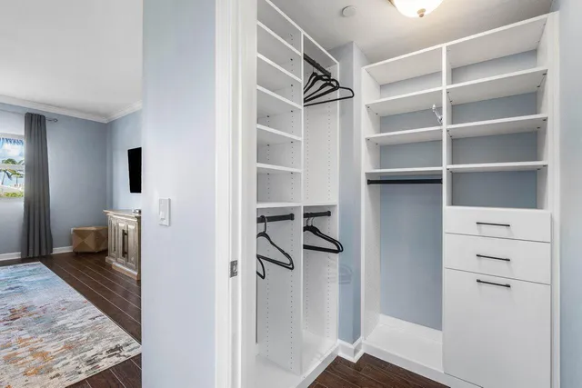 a bathroom with a sink double vanity and a mirror