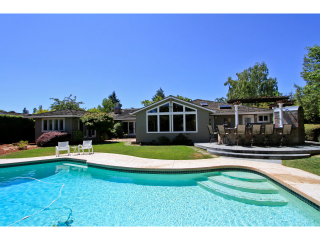 205 Galli Drive Los Altos, CA 94022 - Photo 18 of 20 a balcony with table and chairs