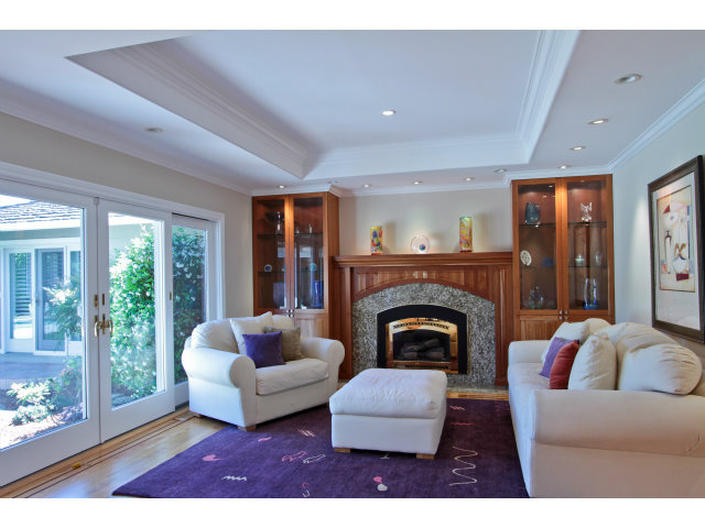 205 Galli Drive Los Altos, CA 94022 - Photo 3 of 20 a living room with furniture and a fireplace