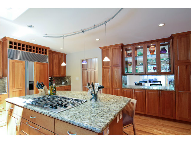 205 Galli Drive Los Altos, CA 94022 - Photo 9 of 20 a kitchen with stainless steel appliances granite countertop a stove a sink dishwasher and cabinets with wooden floor