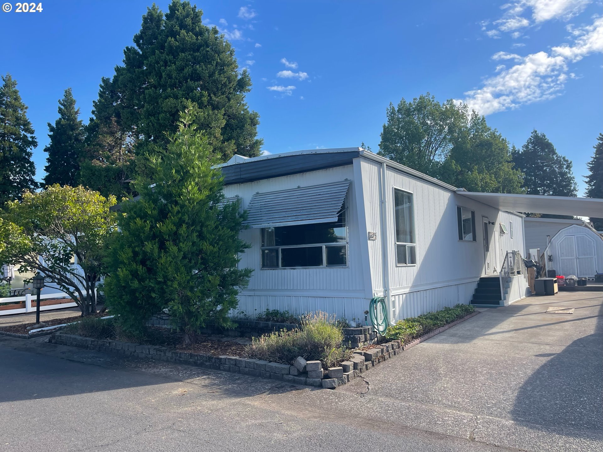 1800 Lakewood Court, Unit 5 Eugene, OR 97402 - Photo 1 of 23 a view of a house with a yard