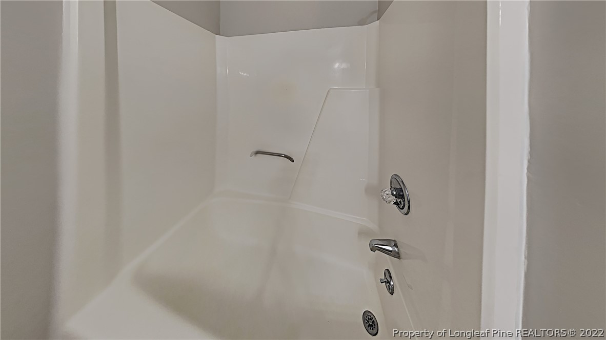 6536 Grist Mill Road Fayetteville, NC 28314 - Photo 18 of 20 a bathroom with a shower