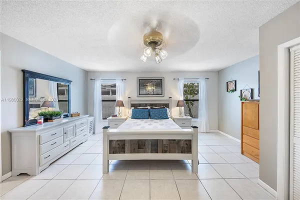 a living room with granite countertop furniture and fireplace