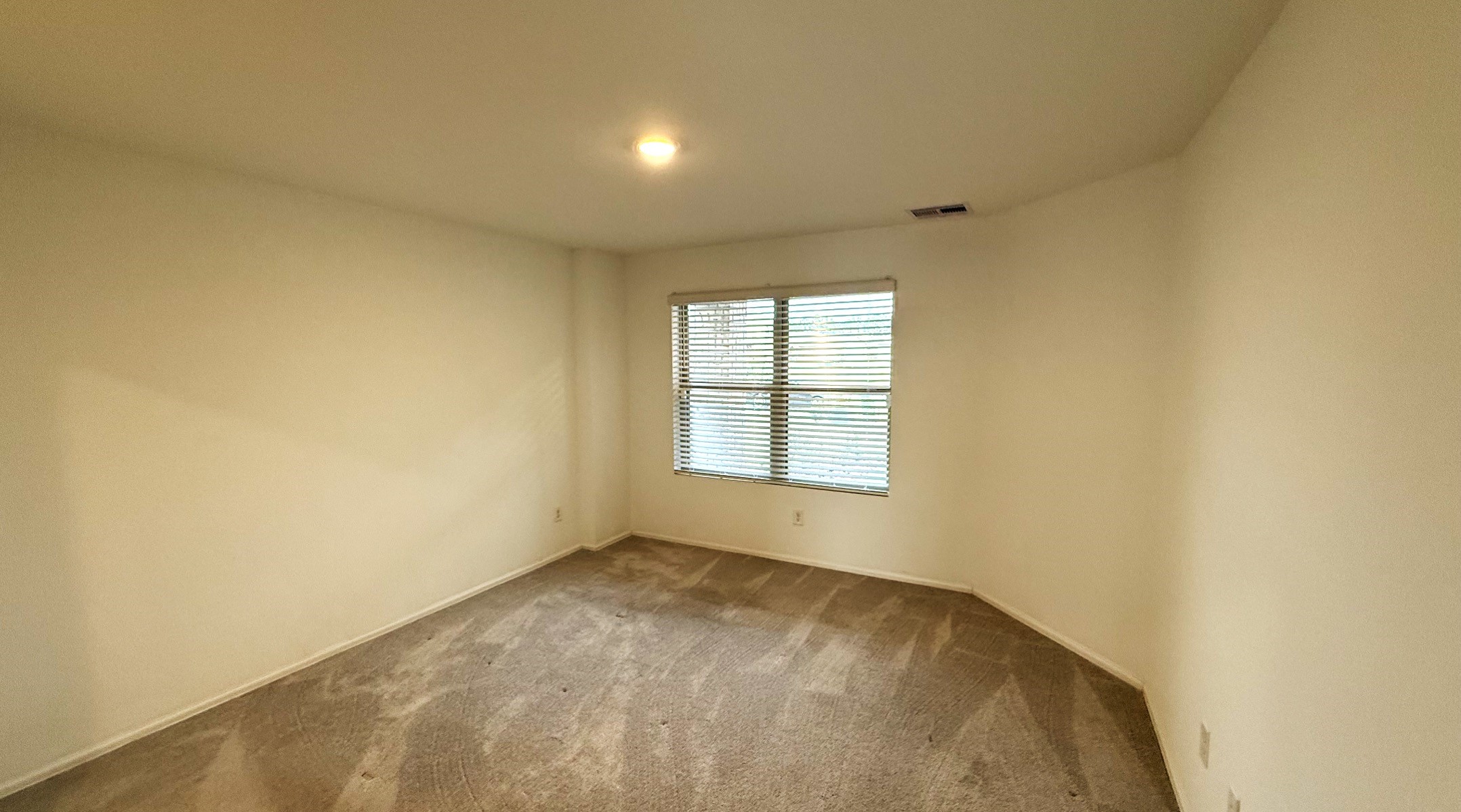 18926 Panzini Drive New Caney, TX 77357 - Photo 21 of 23 an empty room with a window