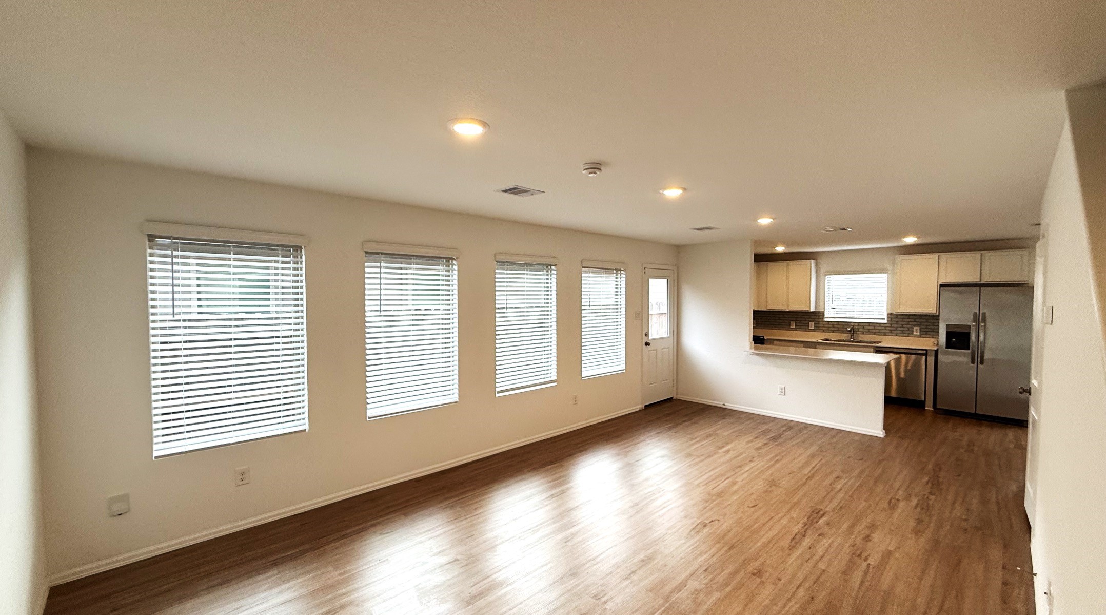 18926 Panzini Drive New Caney, TX 77357 - Photo 5 of 23 a view of kitchen with sink and wooden floor