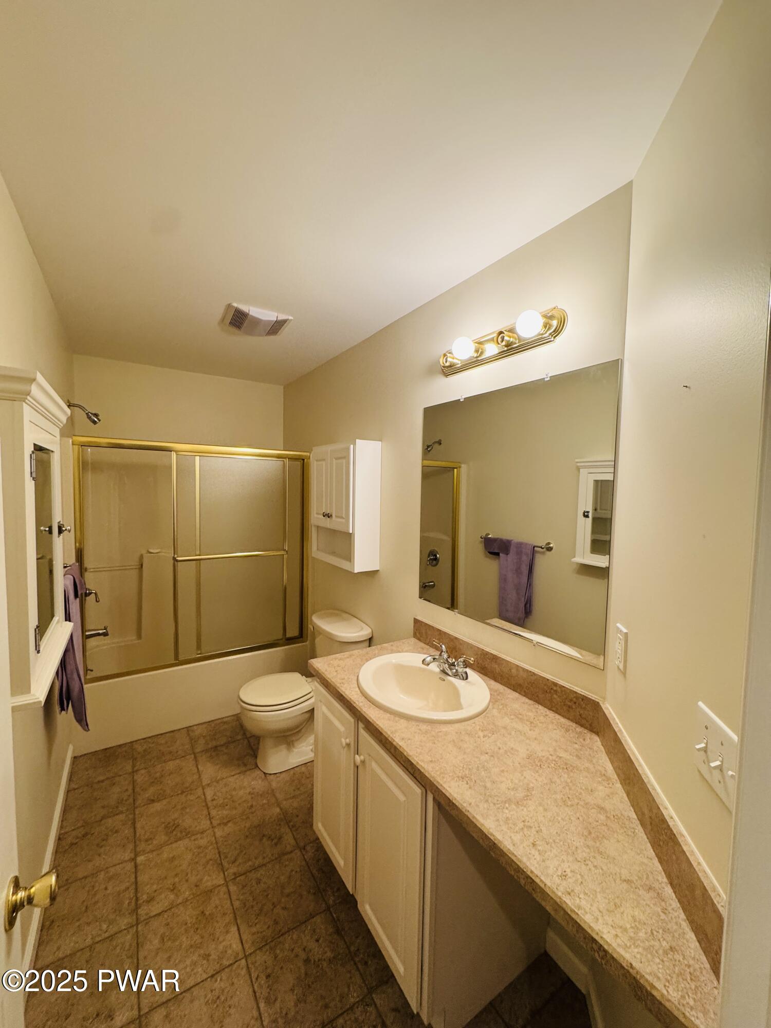 137 Rodeo Drive Hawley, PA 18428 - Photo 23 of 68 a bathroom with a sink a toilet and shower