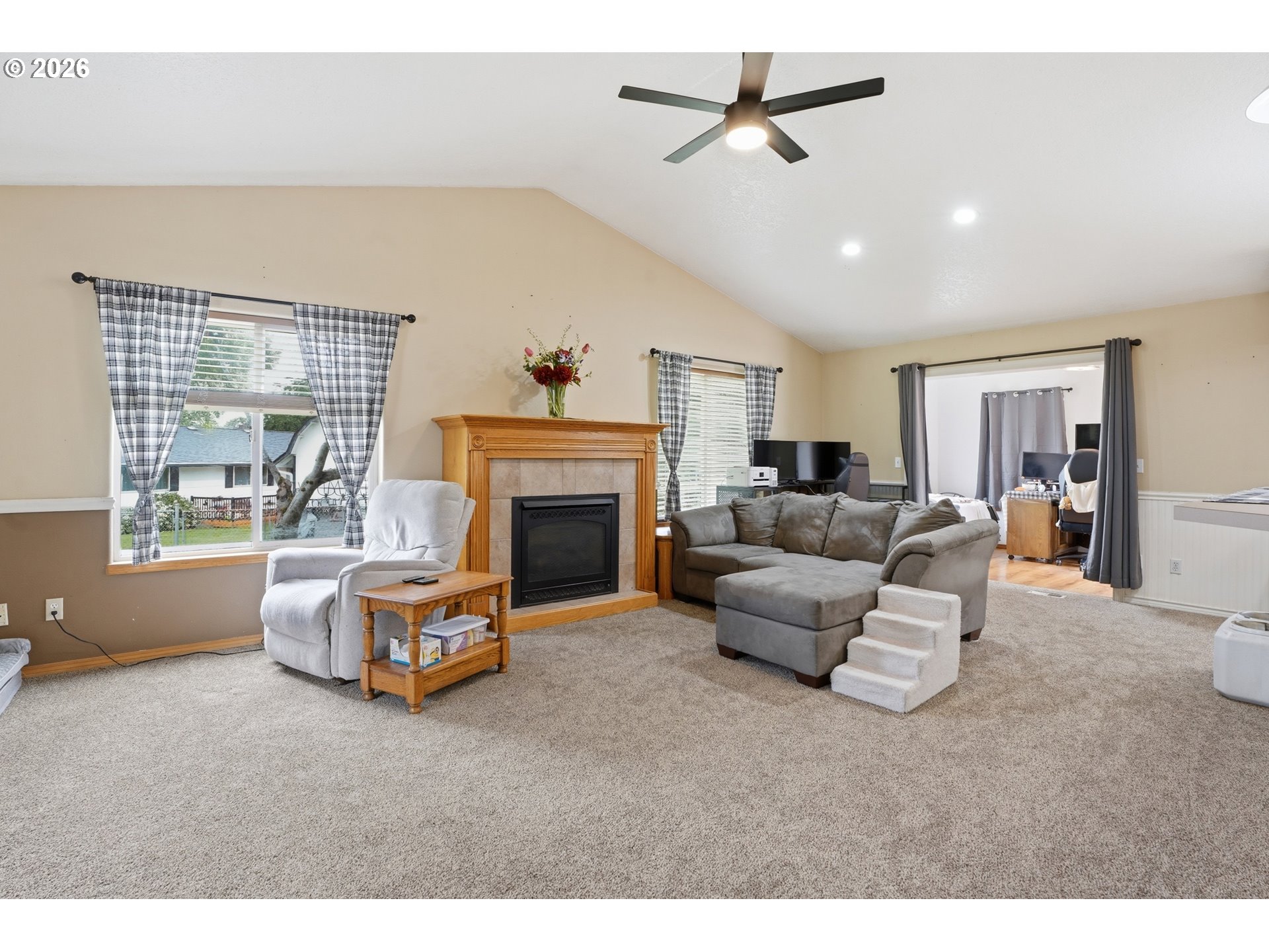 105 Toliver Road Molalla, OR 97038 - Photo 5 of 34 a living room with furniture and a fireplace