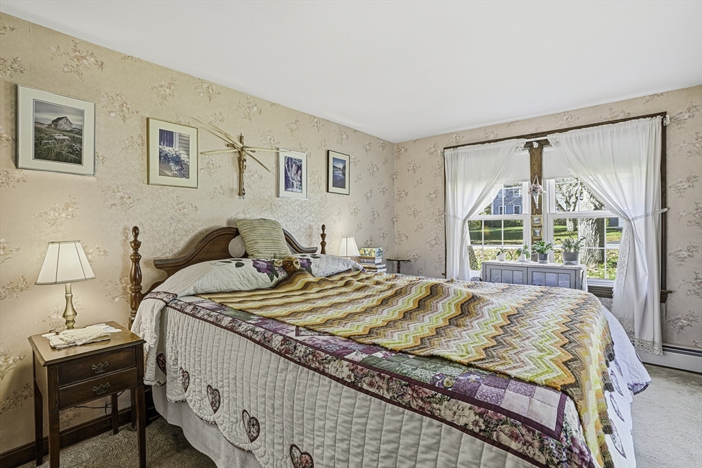39 Mechanic Street Upton, MA 01568 - Photo 15 of 35 a bedroom with a bed and a window