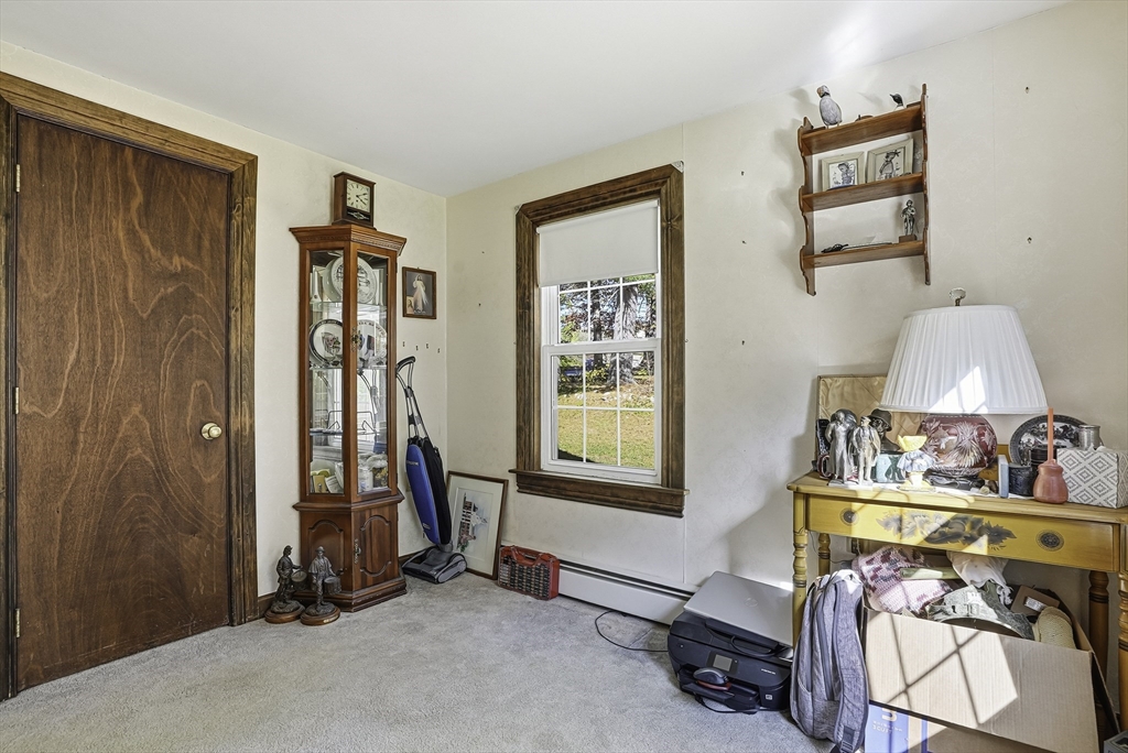 39 Mechanic Street Upton, MA 01568 - Photo 18 of 35 a view of room with window and couch
