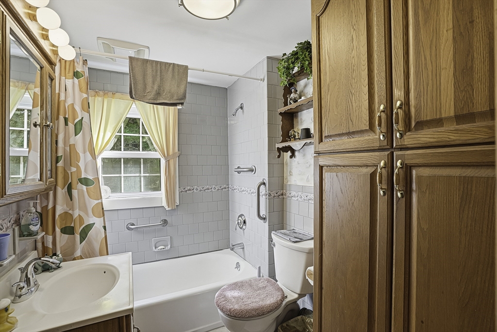 39 Mechanic Street Upton, MA 01568 - Photo 19 of 35 a bathroom with a sink toilet and shower