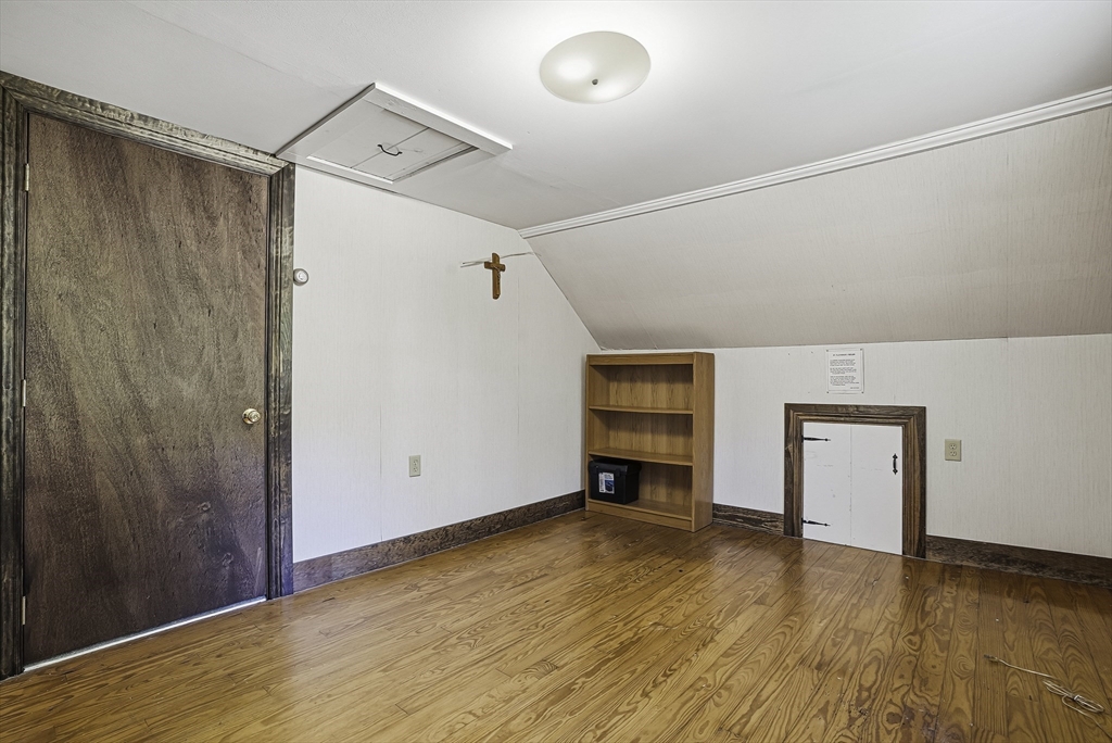 39 Mechanic Street Upton, MA 01568 - Photo 21 of 35 a view of empty room with wooden floor and fan