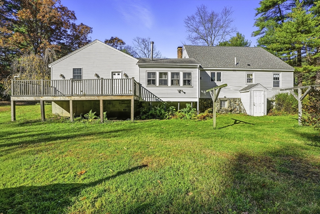 39 Mechanic Street Upton, MA 01568 - Photo 28 of 35 a front view of a house with a yard
