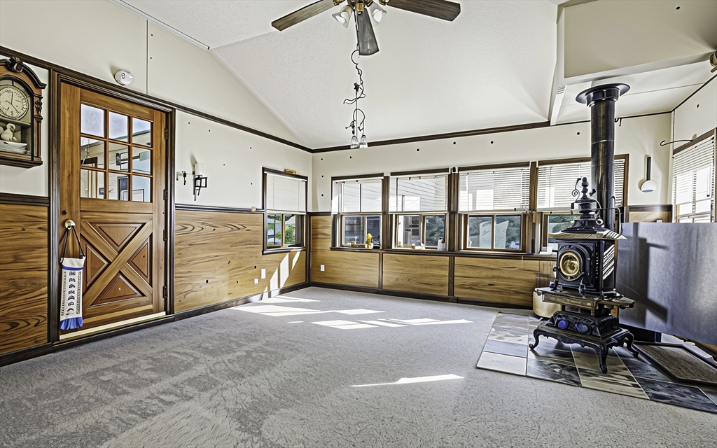 39 Mechanic Street Upton, MA 01568 - Photo 4 of 35 a view of a room with gym equipment