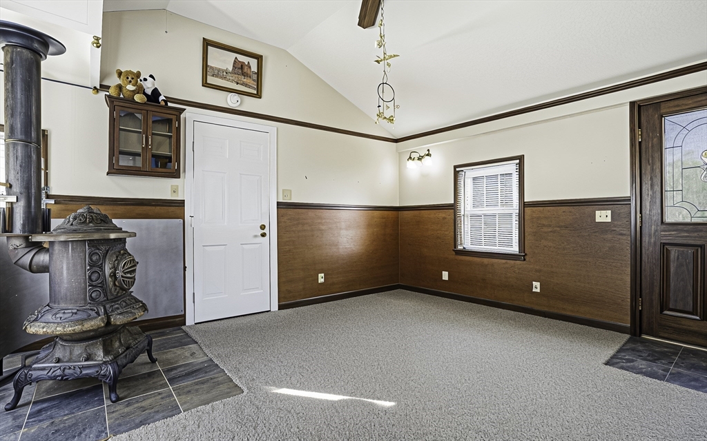 39 Mechanic Street Upton, MA 01568 - Photo 5 of 35 a view of an empty room with a window
