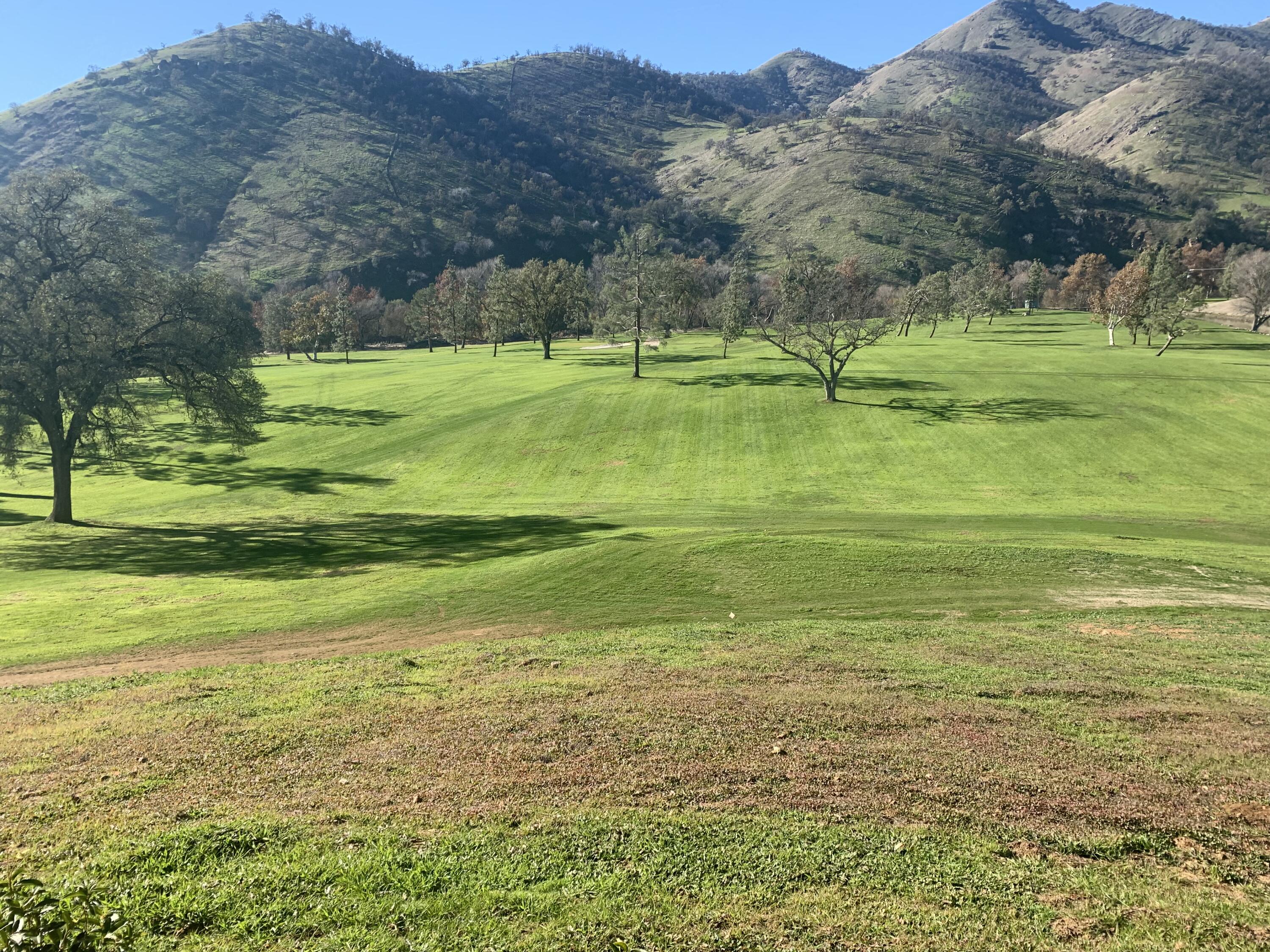 0 Sierra Drive Three Rivers, CA 93271 - Photo 15 of 17 a view of a golf course with a yard