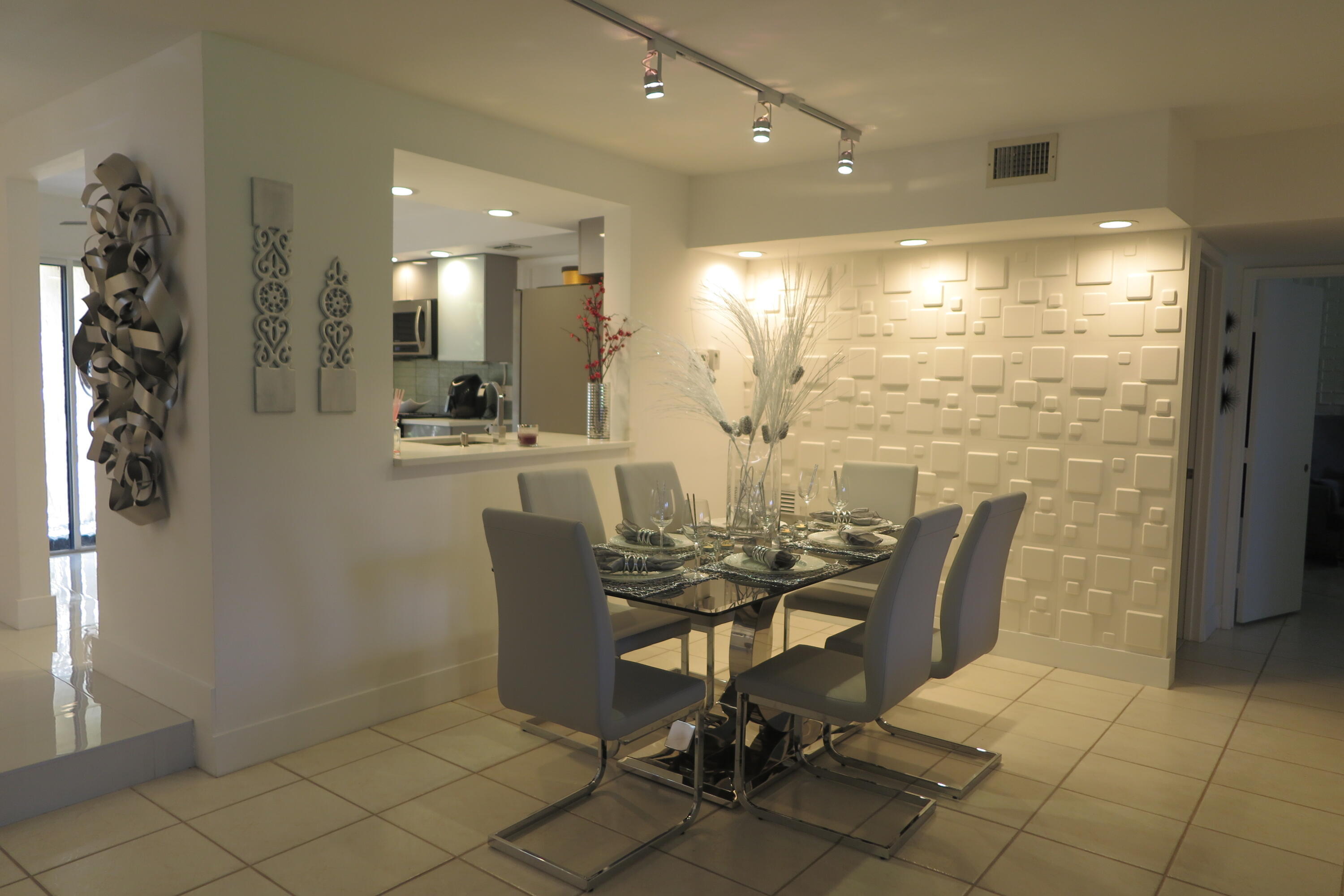 7875 La Mirada Drive Boca Raton, FL 33433 - Photo 9 of 31 a view of a dining room with furniture