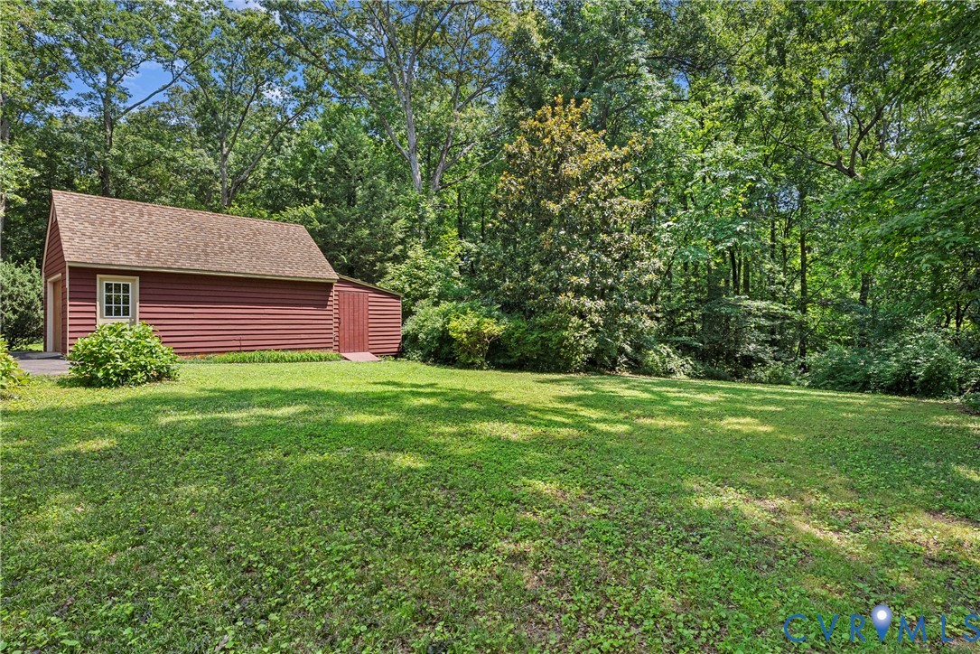 8707 Brown Summit Road North Chesterfield, VA 23235 - Photo 56 of 72 Expansive green yard featuring a detached garage a
