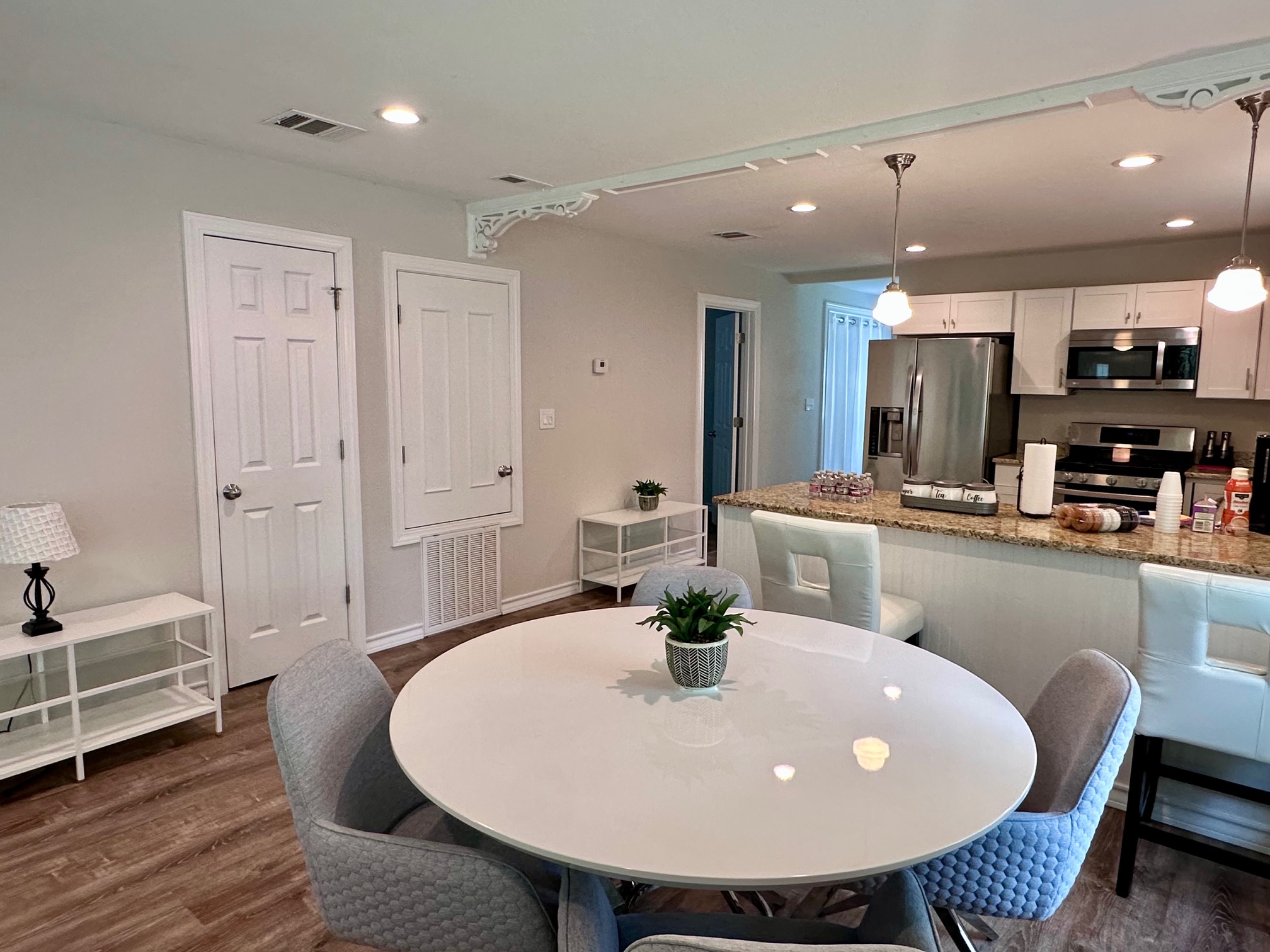404 Rivers Street Smithville, TX 78957 - Photo 12 of 27 Open-concept dining area with wood-finish flooring