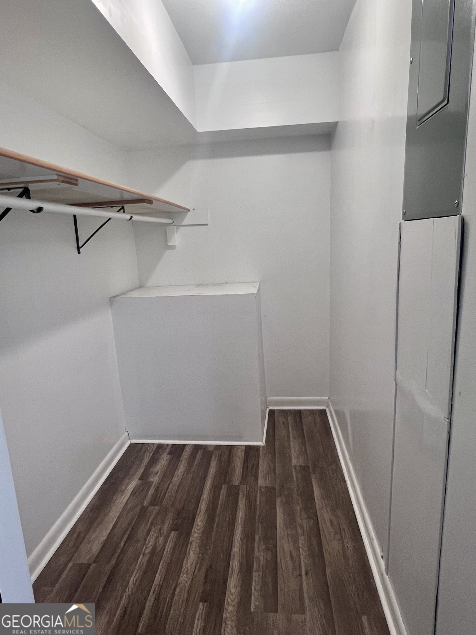 594 South 3rd Street Jesup, GA 31545 - Photo 20 of 32 a view of a room with wooden floor