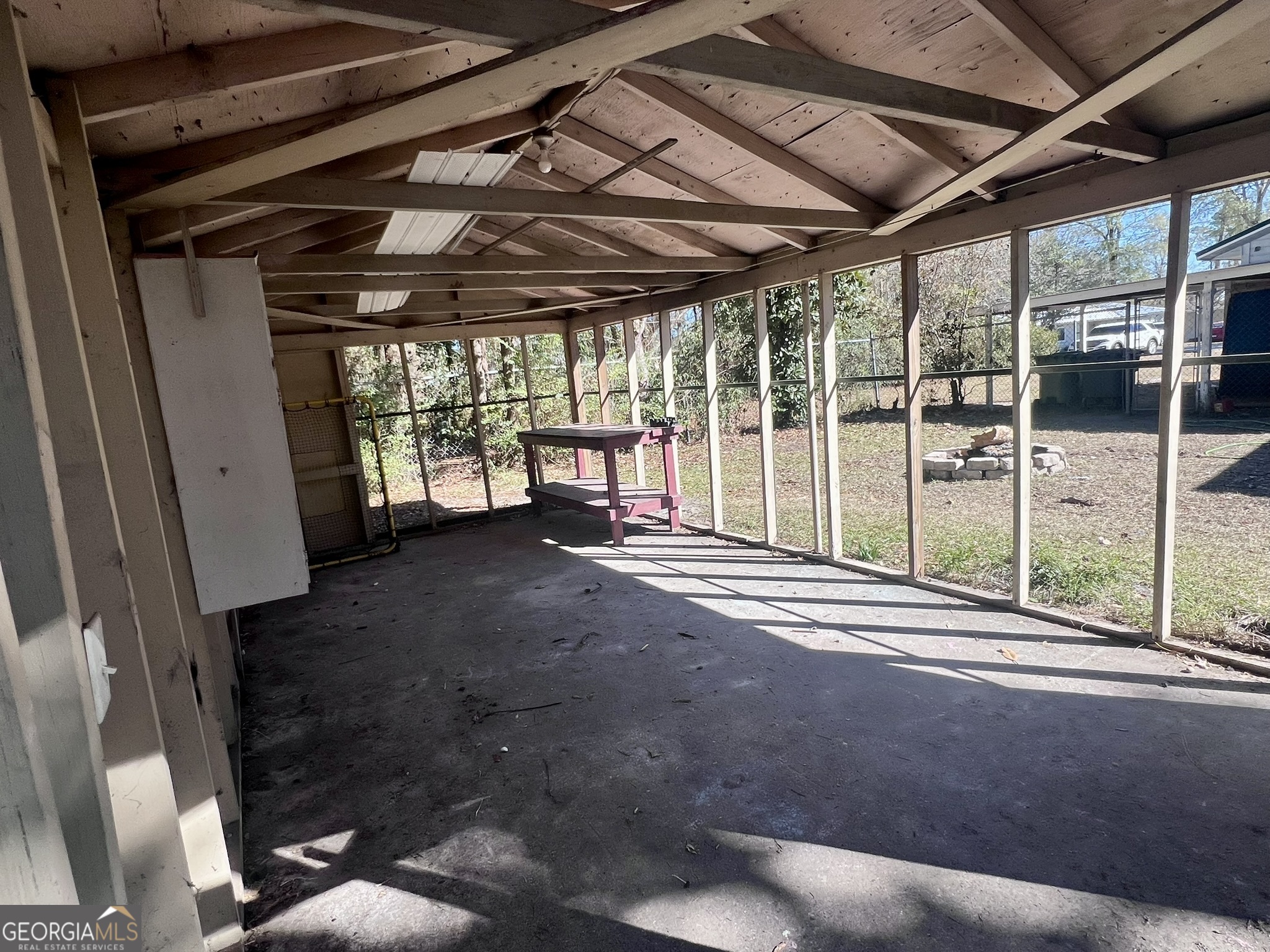 594 South 3rd Street Jesup, GA 31545 - Photo 27 of 32 a view of an empty room with a sliding door